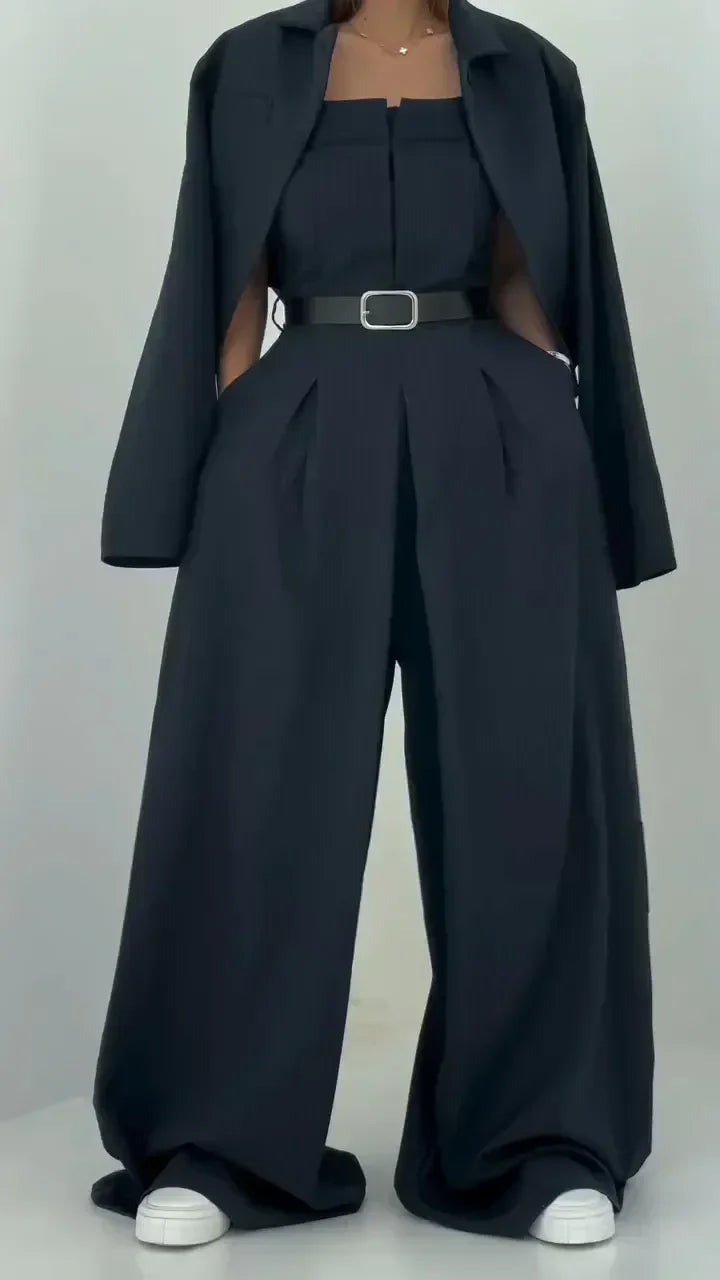 Woman wearing an eclat™ women's bustier set with jacket – chic & fashionable design against a clean white background