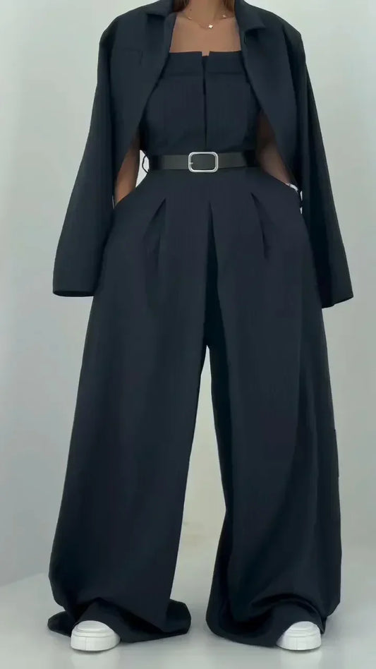 Woman wearing an eclat™ women's bustier set with jacket – chic & fashionable design against a clean white background