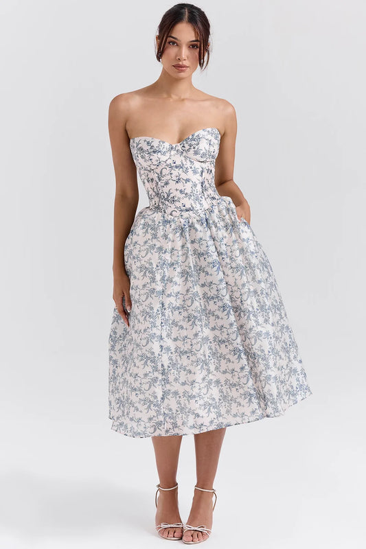 Woman wearing a dress against a clean studio background