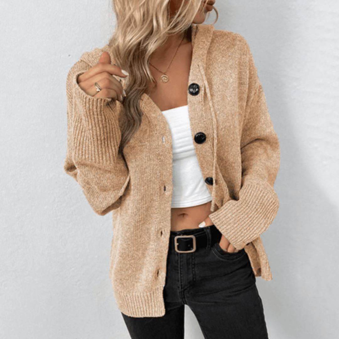 Woman wearing a brittan | button-detail knitted vest against a clean background