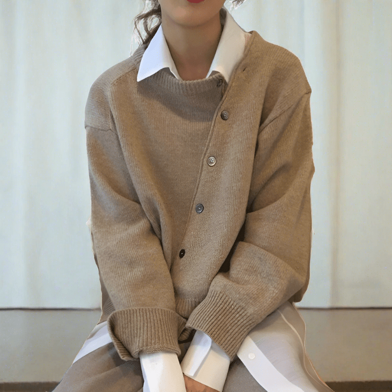 Woman wearing a cathy | relaxed fit cardigan against a soft neutral background