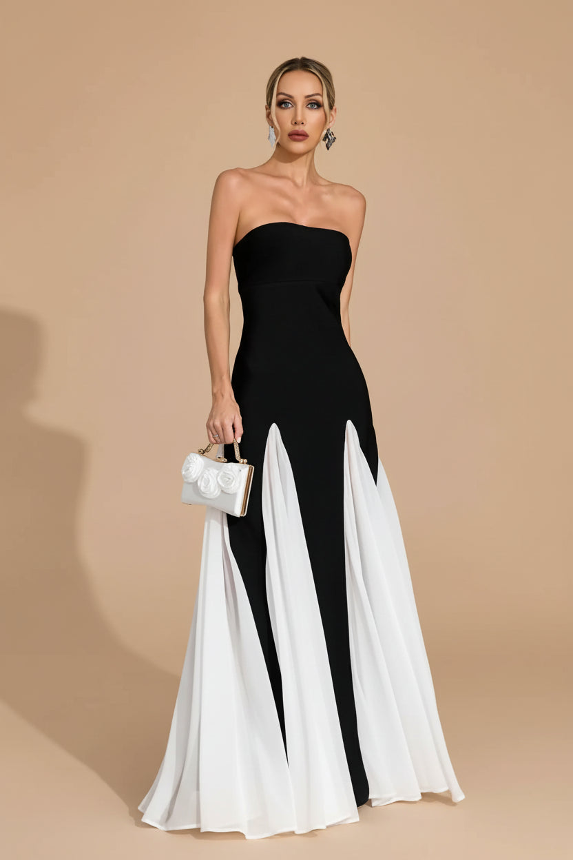 Woman wearing a ball gown against a clean studio background