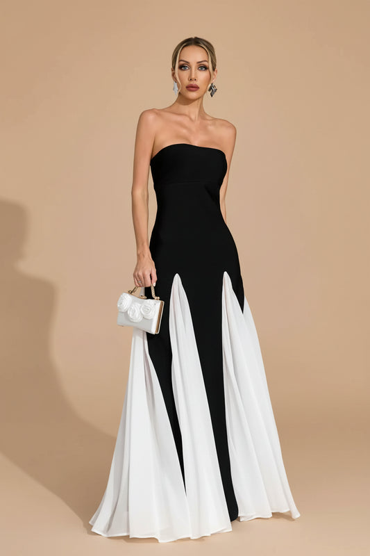 Woman wearing a ball gown against a clean studio background