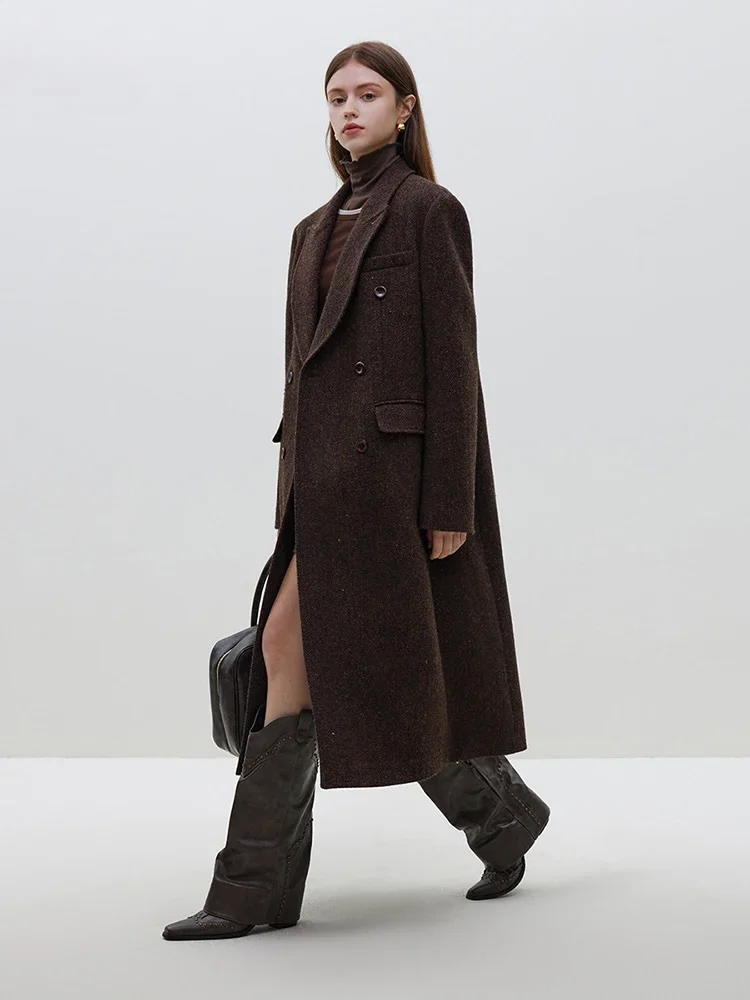 Woman wearing a jacket against a clean white background