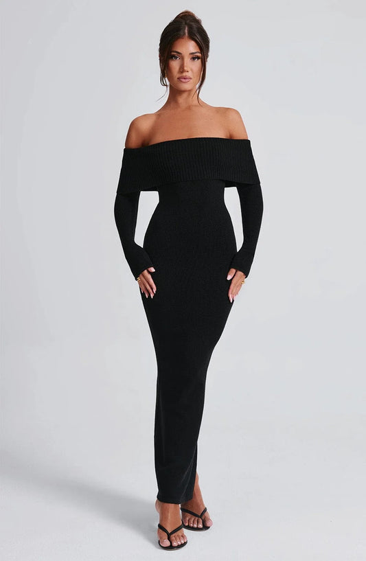 Woman wearing a dress against a clean studio background