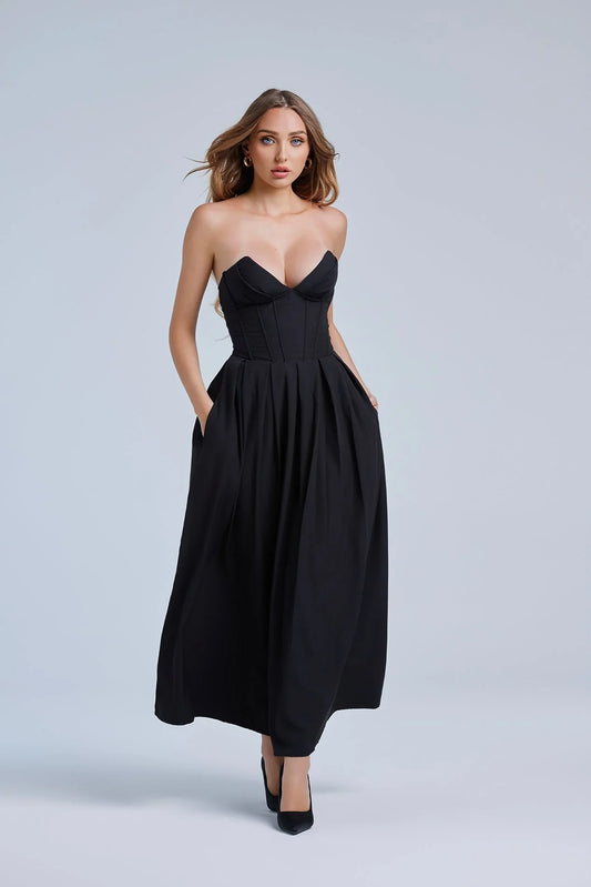 Woman wearing a dress against a clean studio background