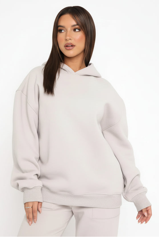 Woman wearing a set against a clean background
