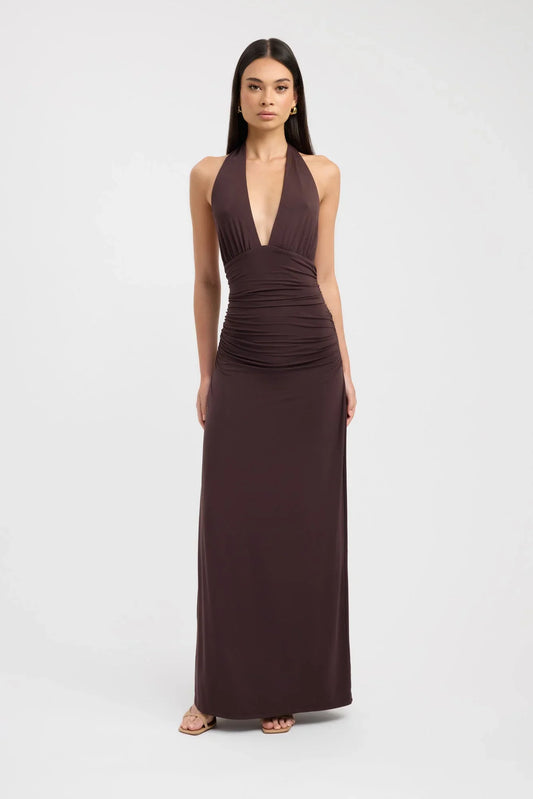 Woman wearing a dress against a clean studio background