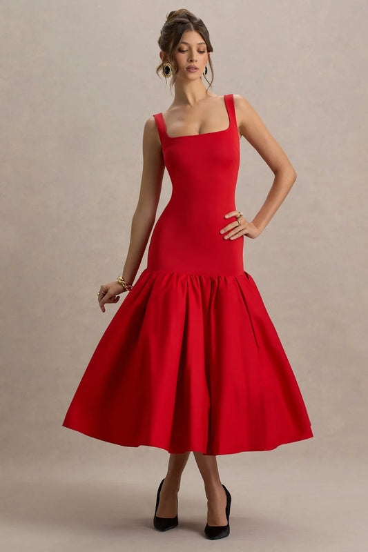 Woman wearing a dress against a clean studio background