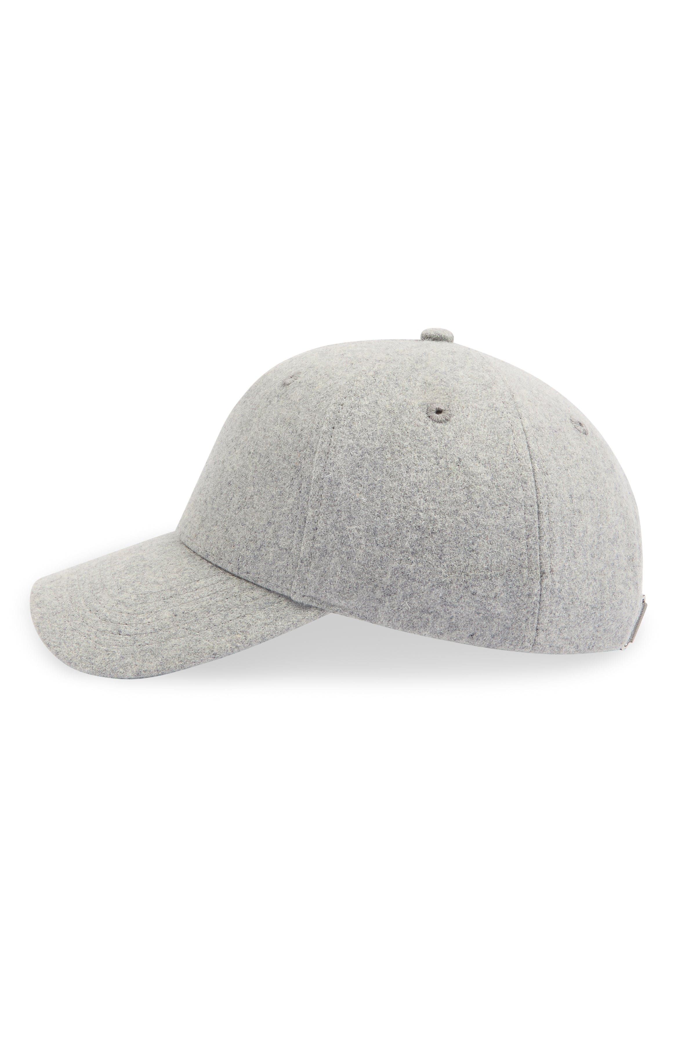 Man wearing a premium wool blend cap - grey marl against a clean background