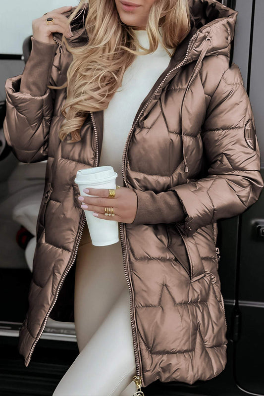 Woman wearing a jacket against a clean white background